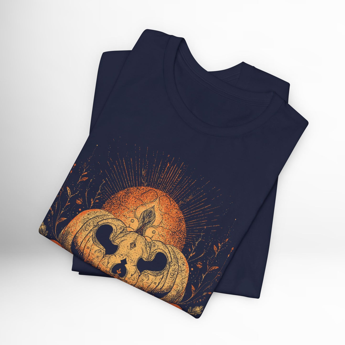 Navy blue t-shirt with a graphic design of pumpkins and leaves on a white background