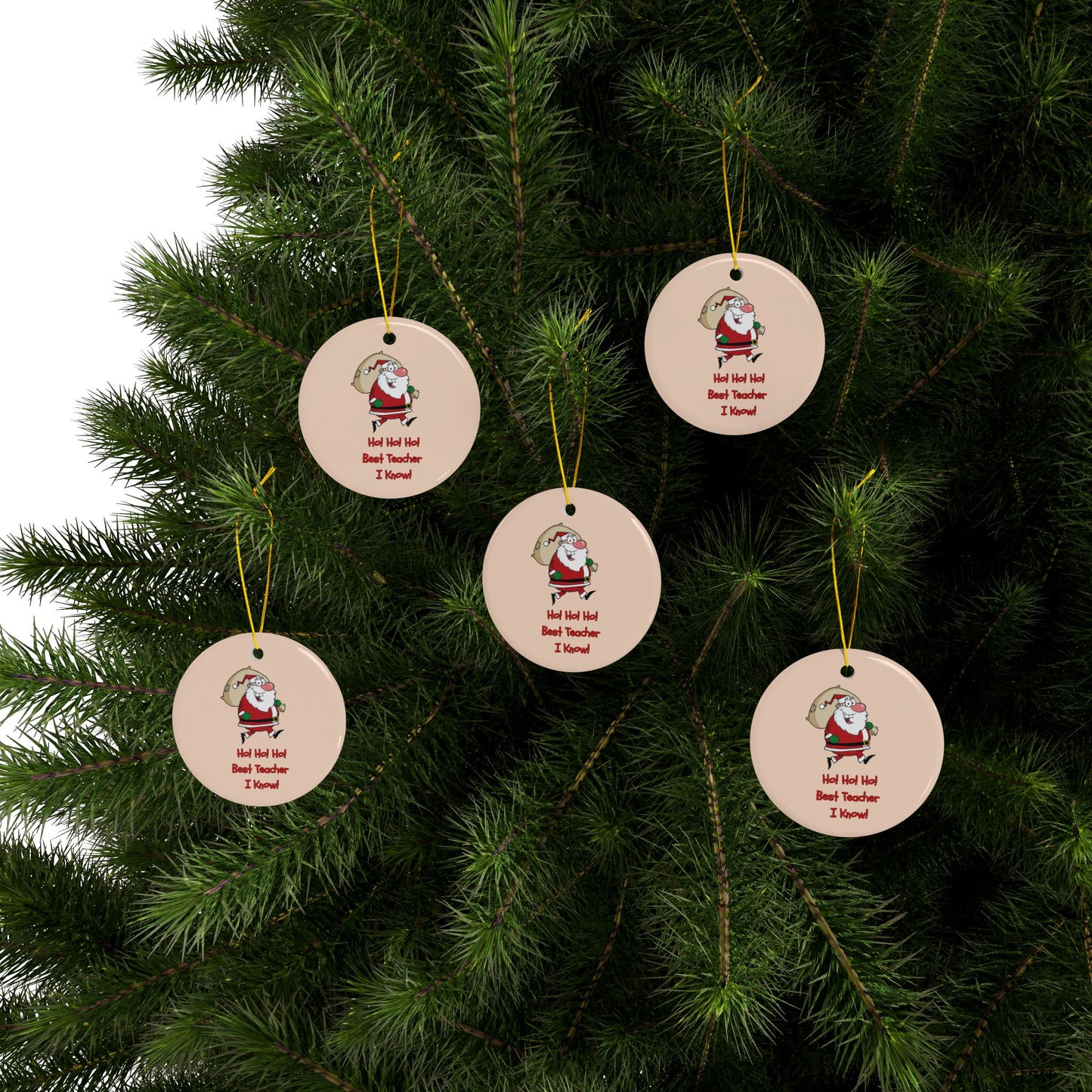Five Christmas tree ornaments with Santa Claus designs hanging on a green tree.