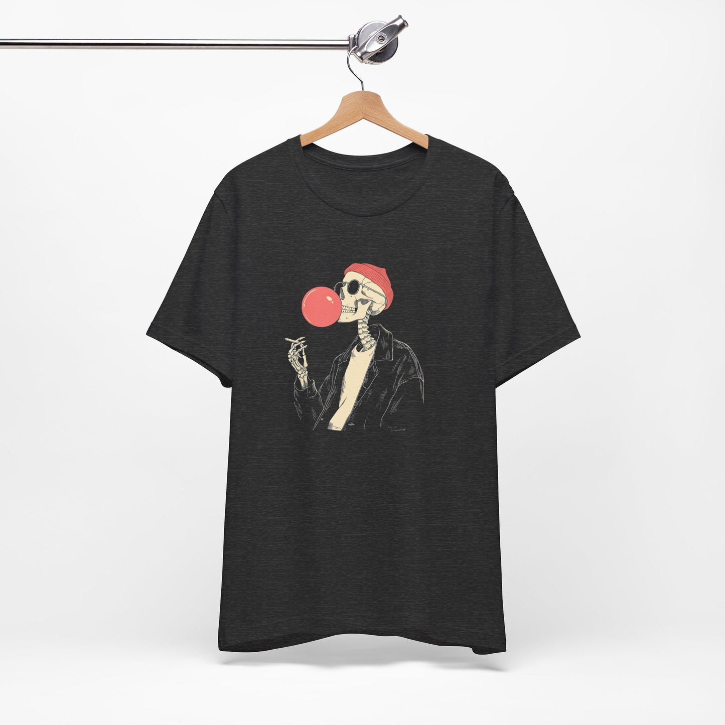 Black t-shirt with a skeleton blowing a bubble gum bubble design on a hanger against a white background.