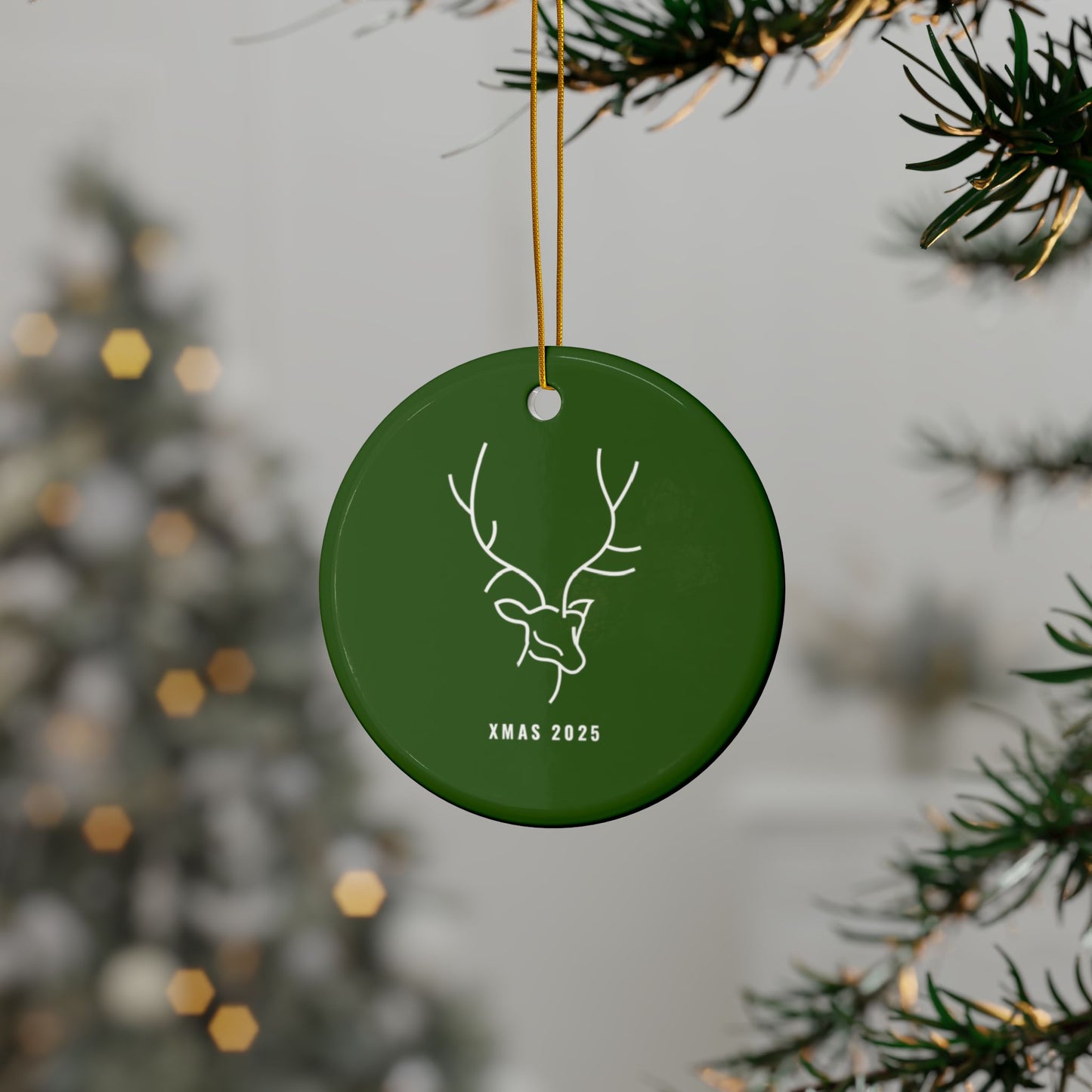 Modern green ceramic reindeer ornament, minimalist Christmas decoration.