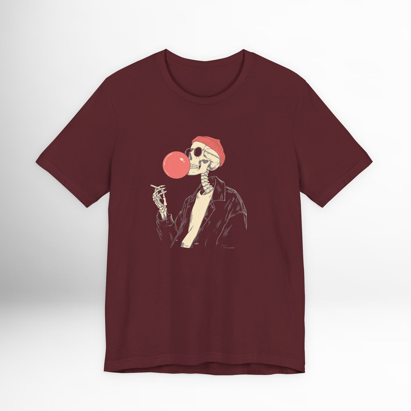 Maroon t-shirt with a skeleton blowing a red bubble gum bubble graphic on a white background