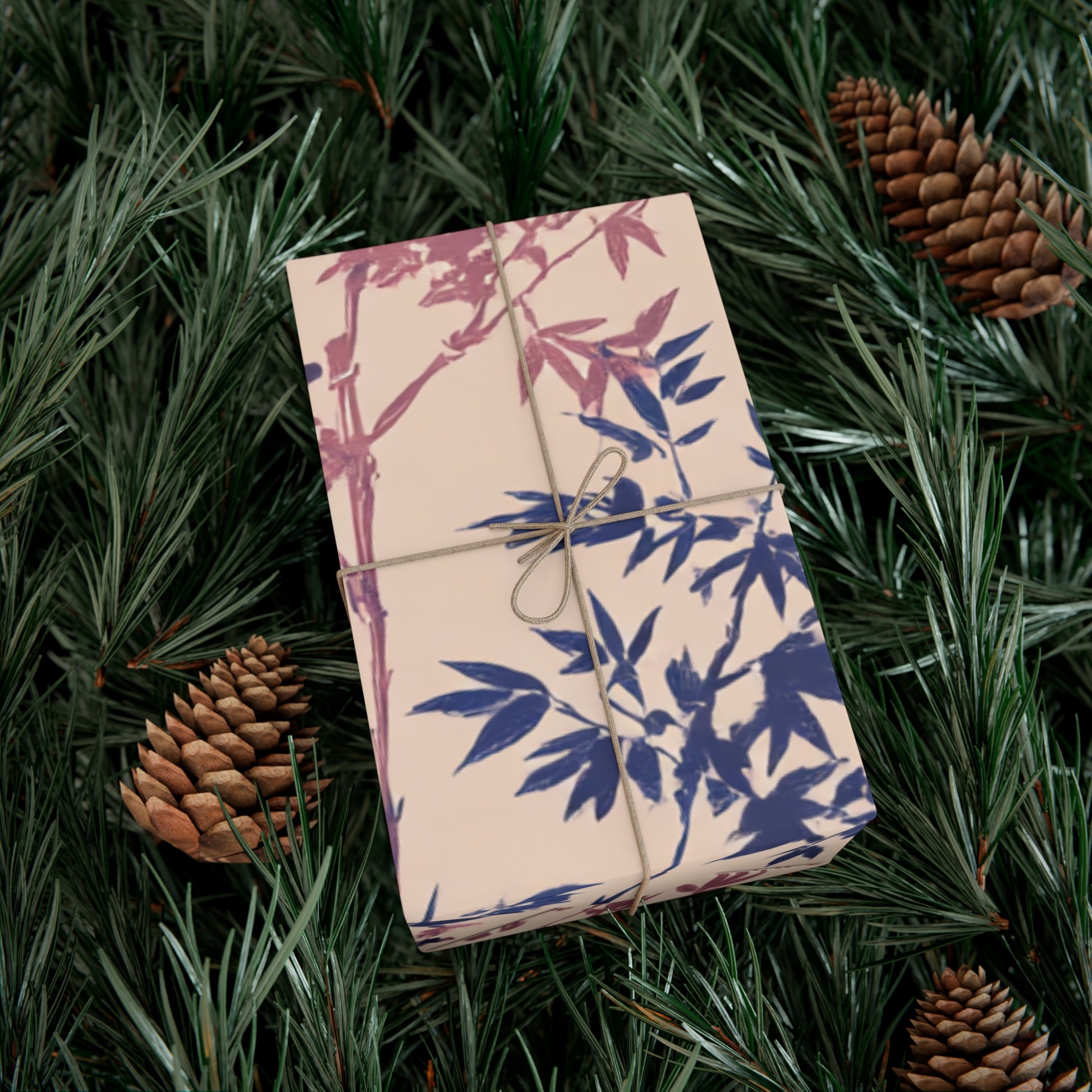 botanical floral wrapping paper with pink and blue branch design.