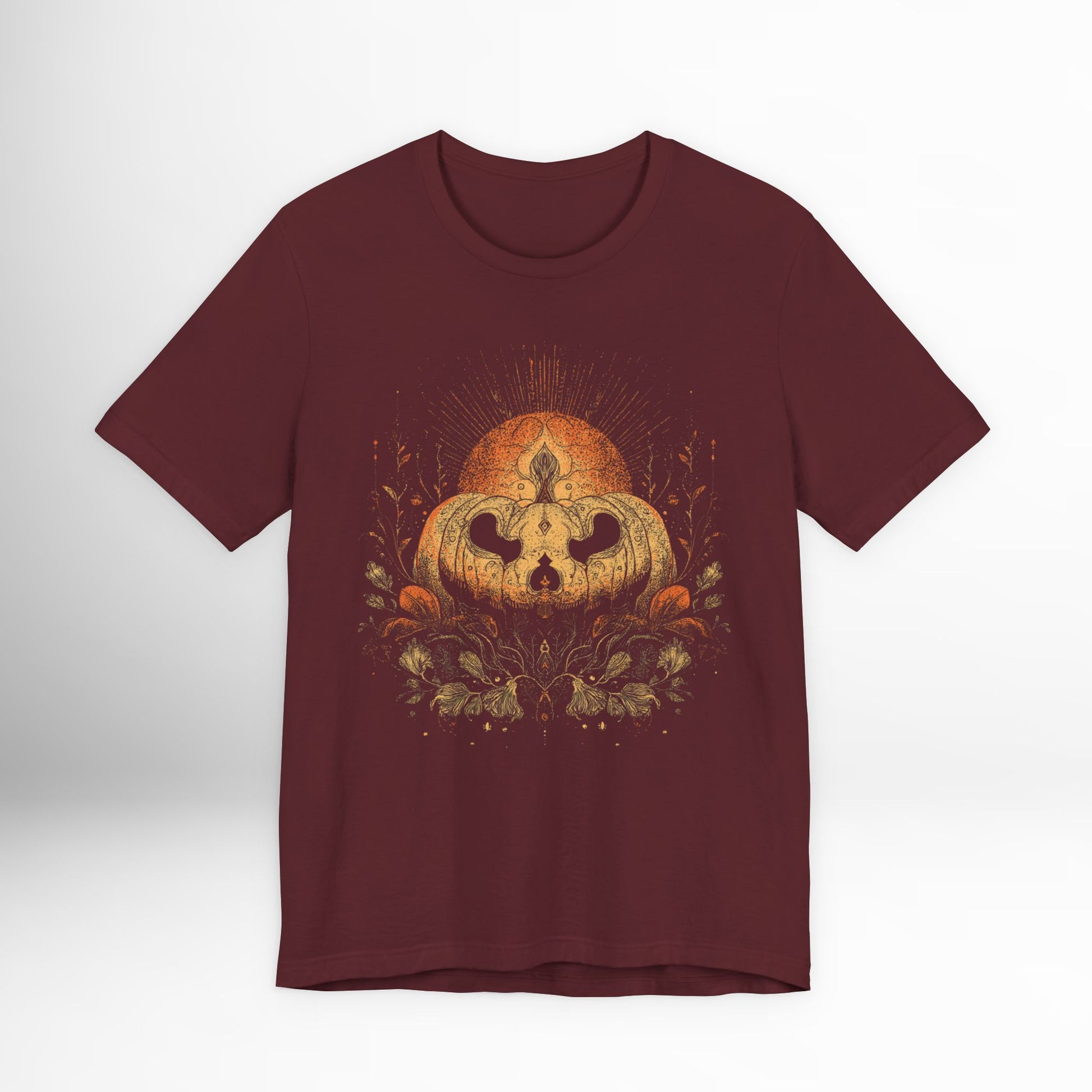 Maroon t-shirt with a pumpkin graphic on a white background
