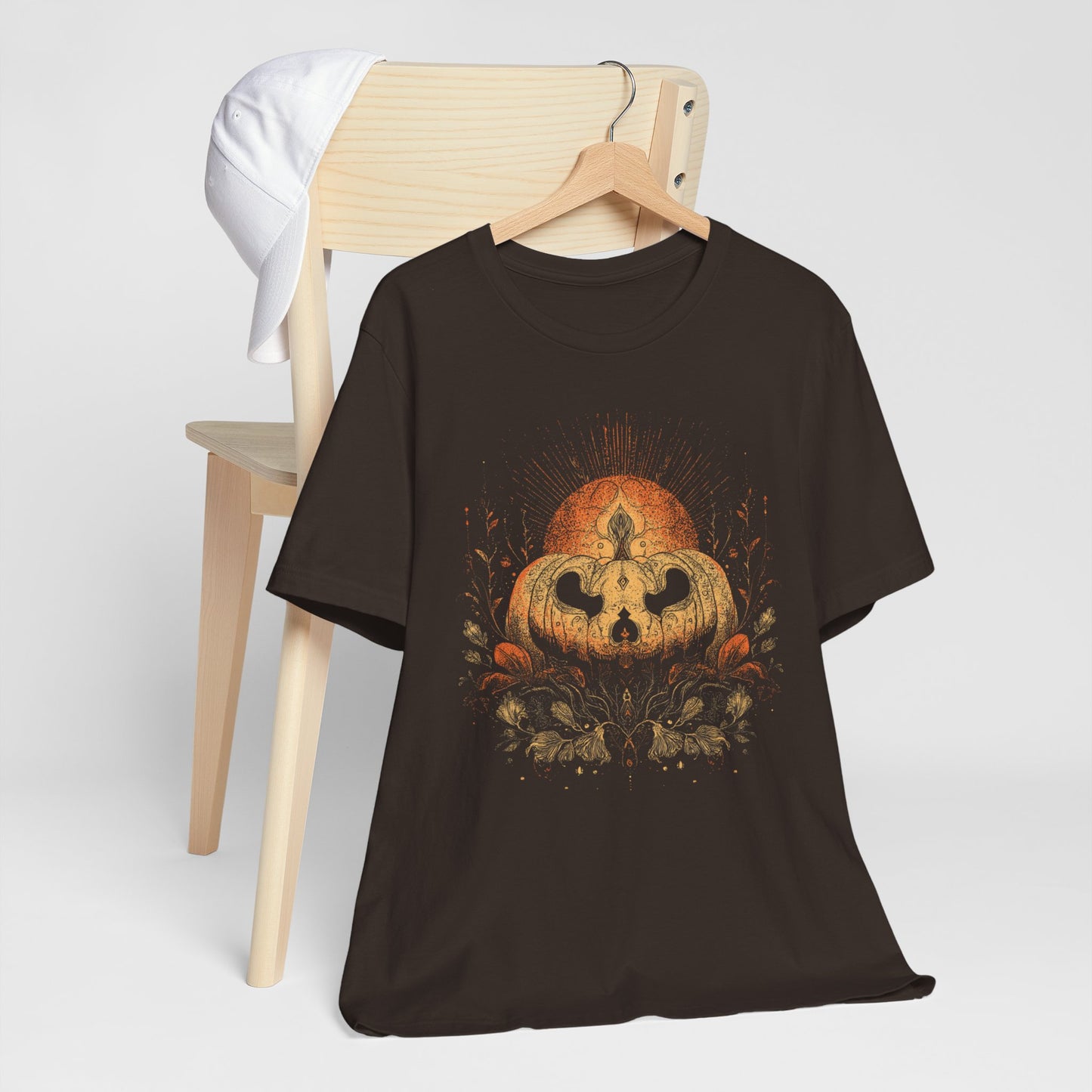 Black t-shirt with boho pumpkin candle fall graphic design.