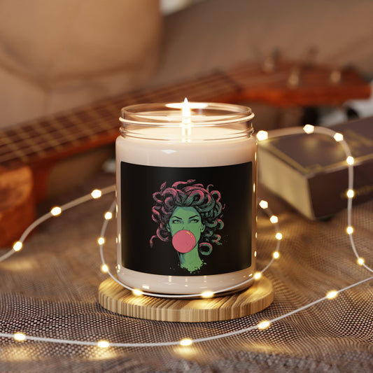 Medusa bubblegum scented jar candle lit in black glass jar – mythology home décor.