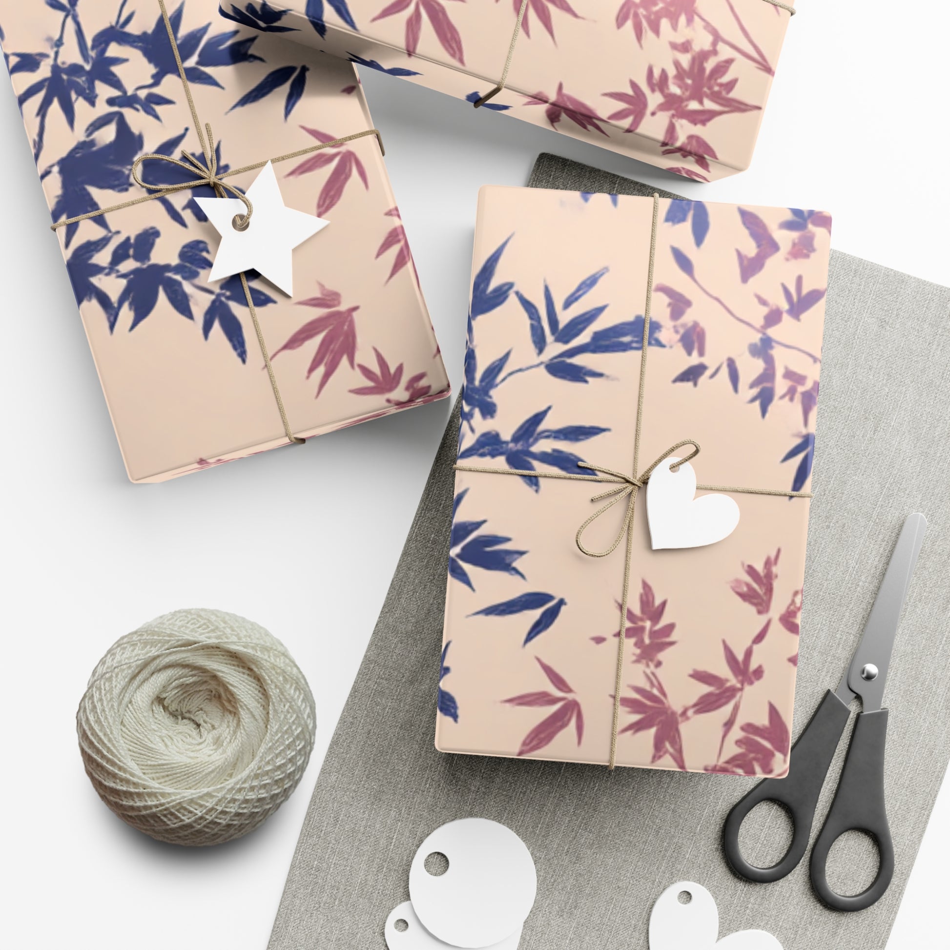 botanical floral wrapping paper with pink and blue branch design.