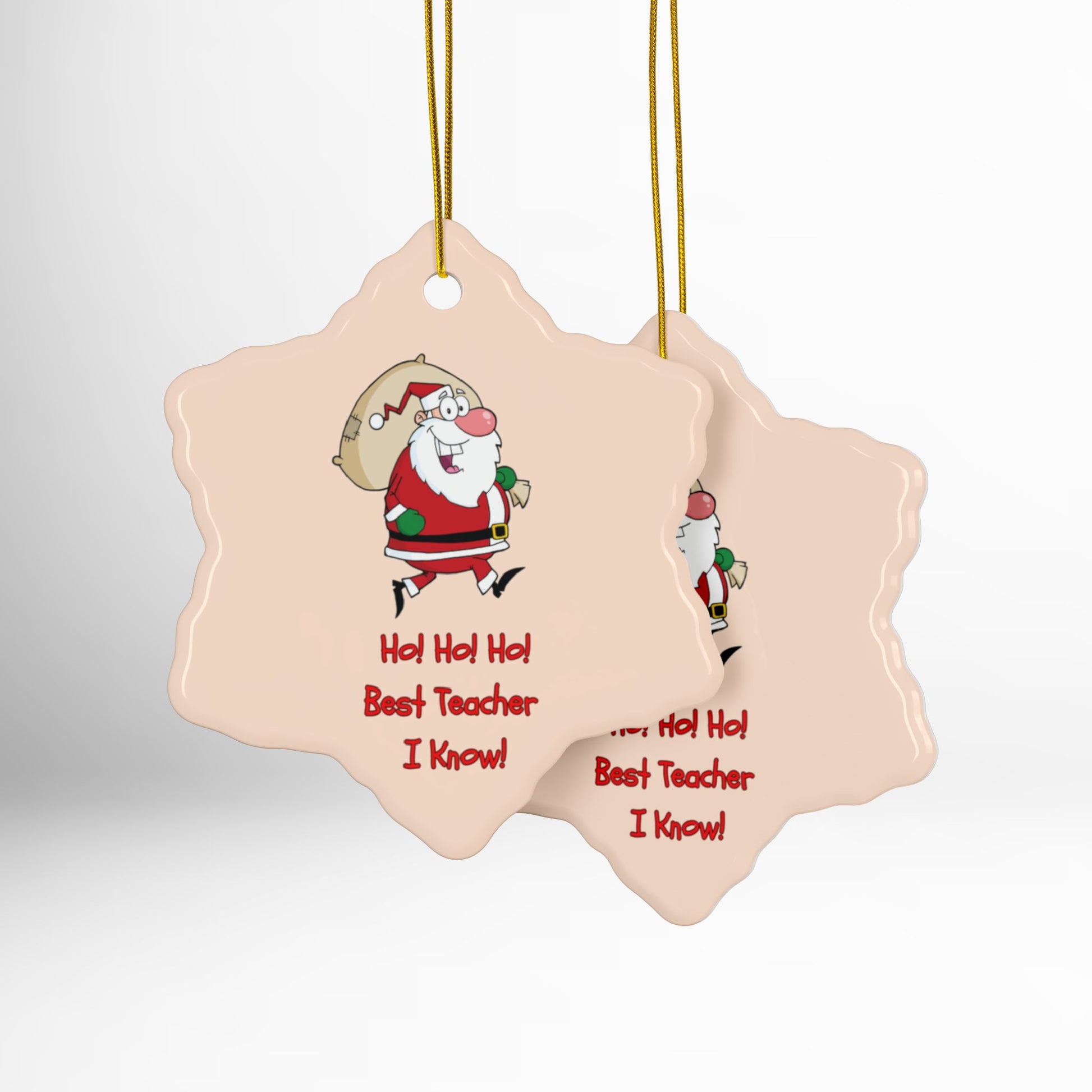 Decorative Christmas ornament with Santa Claus and text on a light pink background