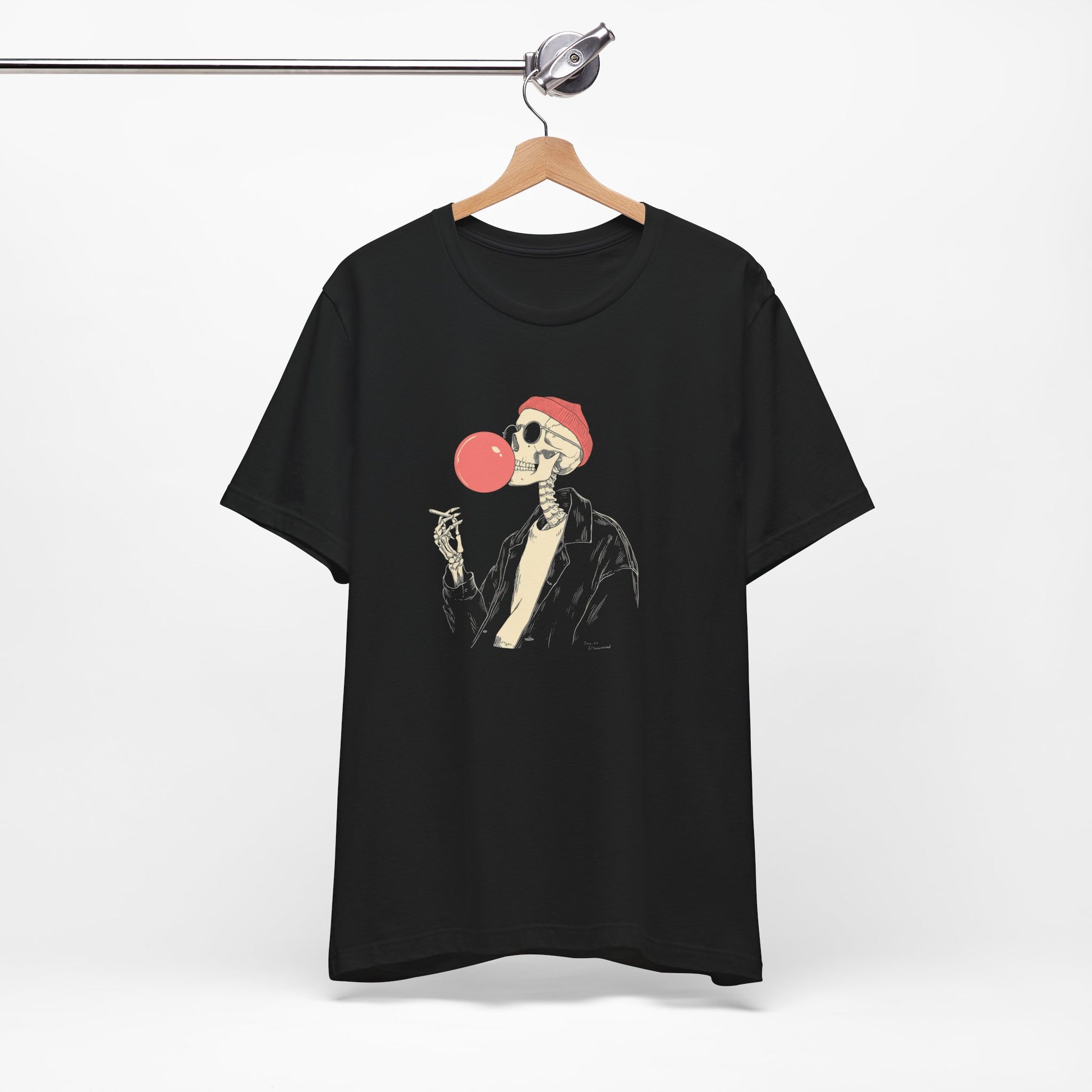 Black t-shirt with a skeleton blowing a red bubble gum bubble design on a white background.