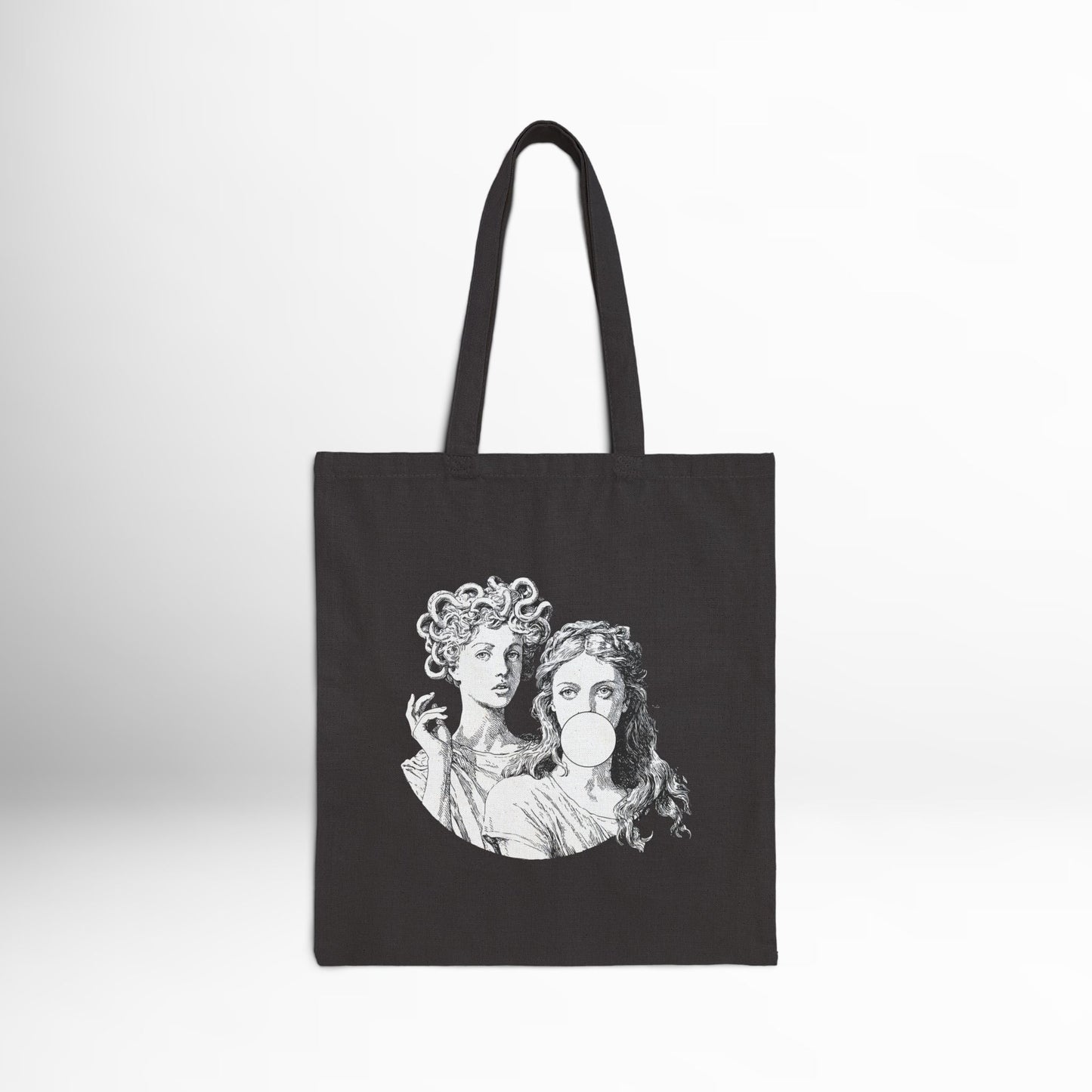 Black cotton tote bag with Medusa and Athena bubblegum design.