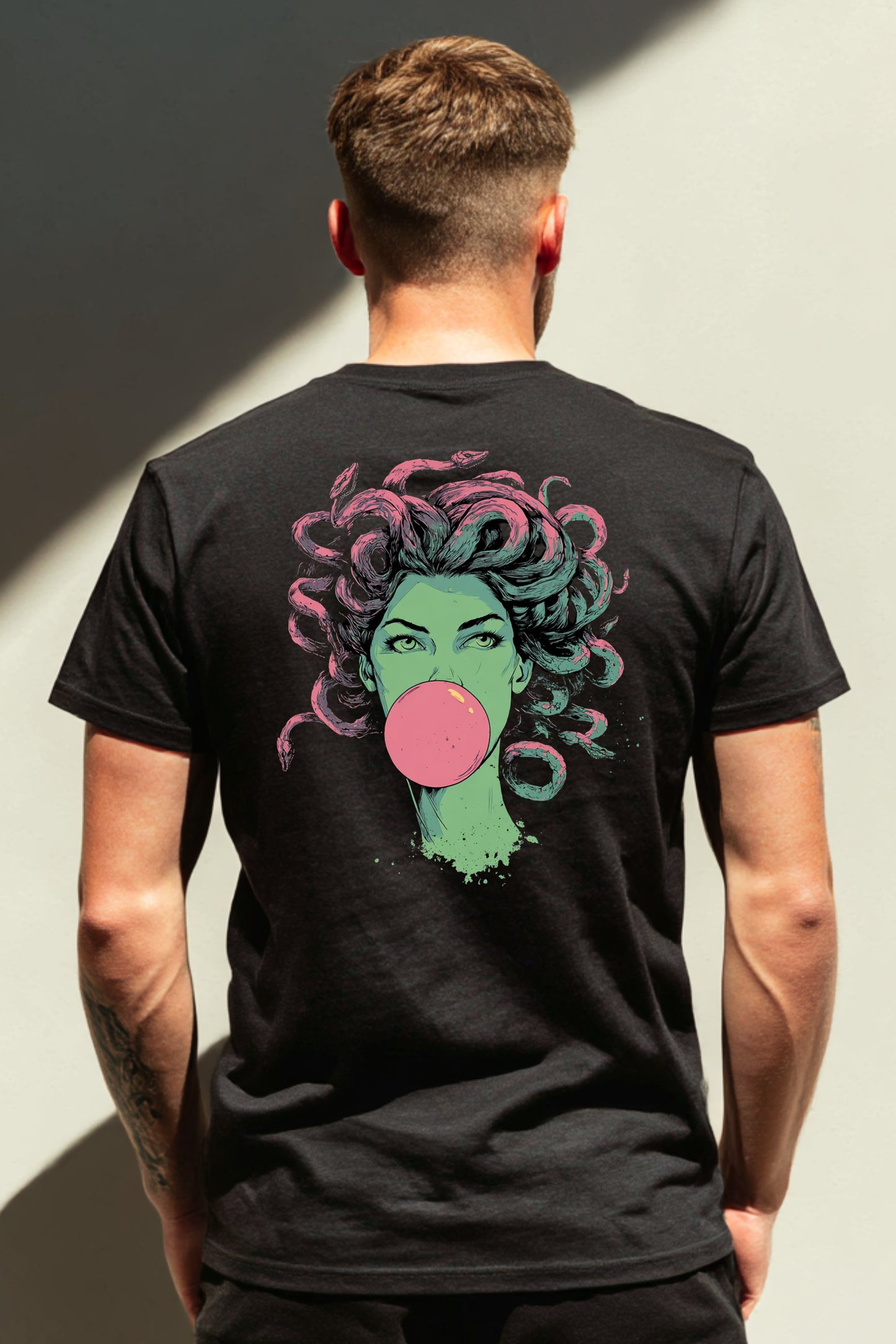 Black t-shirt with Medusa bubblegum design and back print.